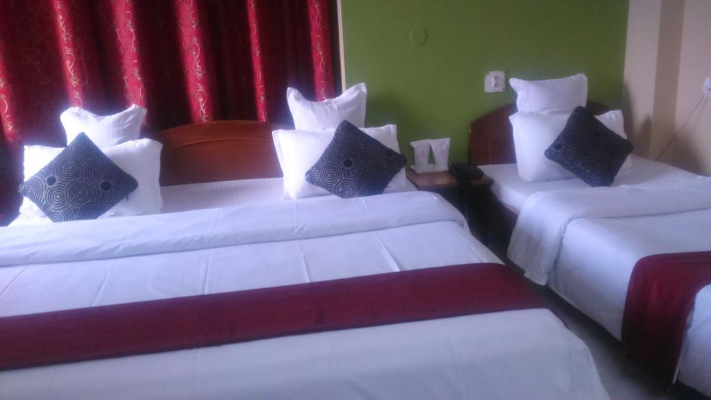 סיליגורי Breeze Hotel חדר תמונה